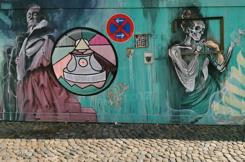 Graffiti on a construction site wall