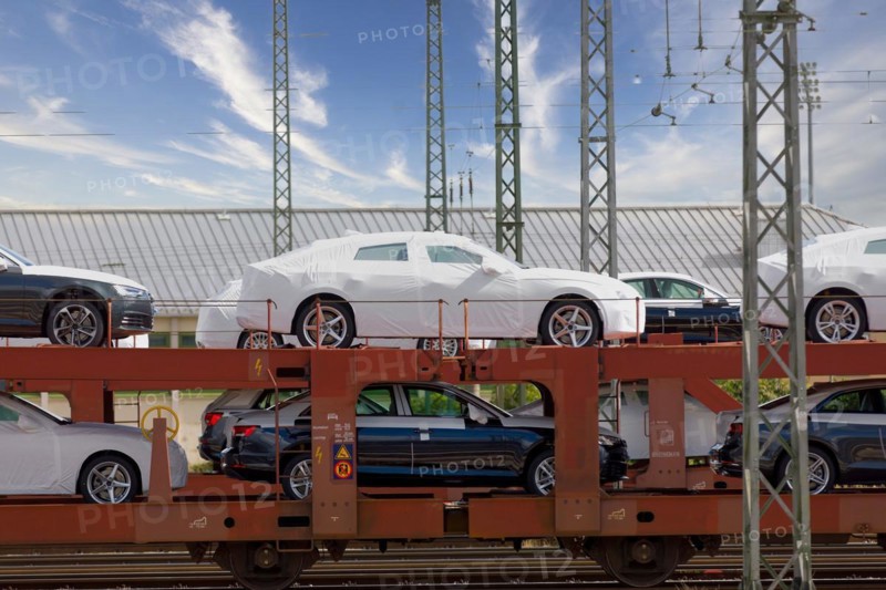 Car loading onto freight wagons