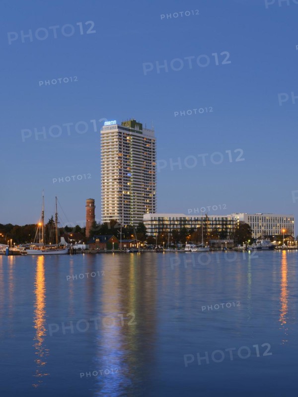 Old lighthouse and Hotel Maritim on the Trave promenade