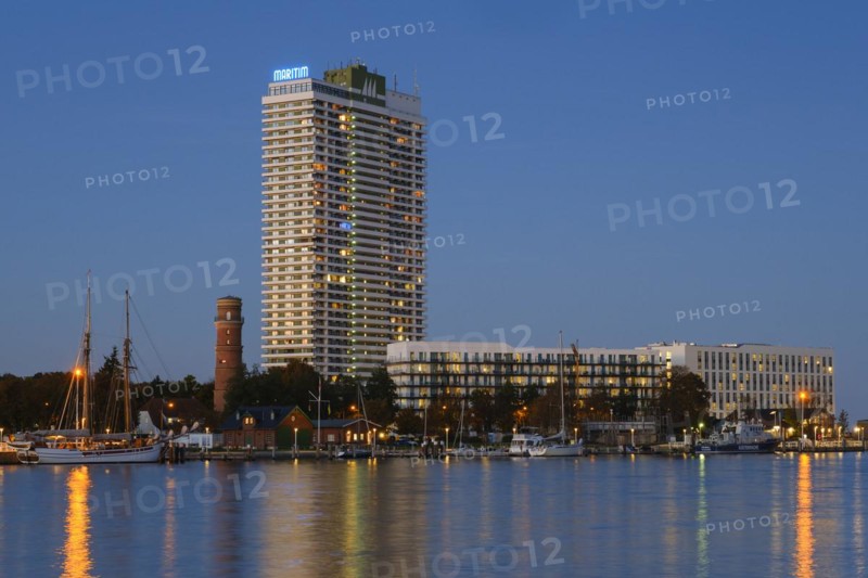Old lighthouse and Hotel Maritim on the Trave promenade