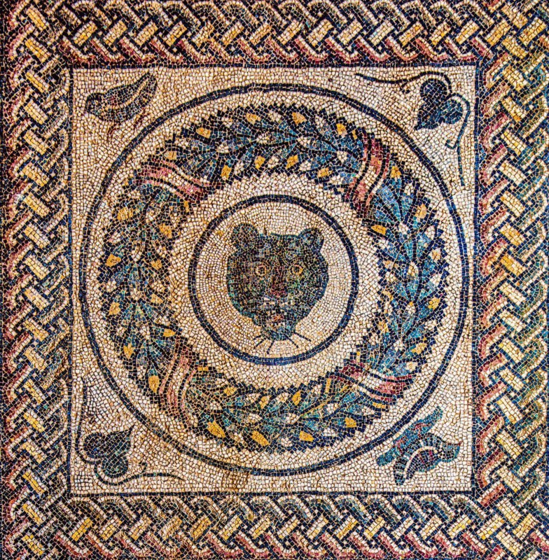 Medallions with animal heads in pery style