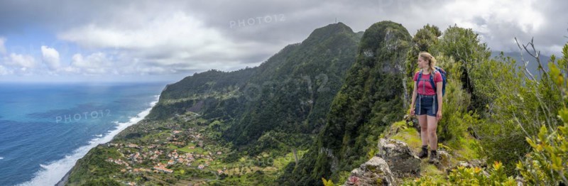 Hiker on the ridge of Pico do Alto