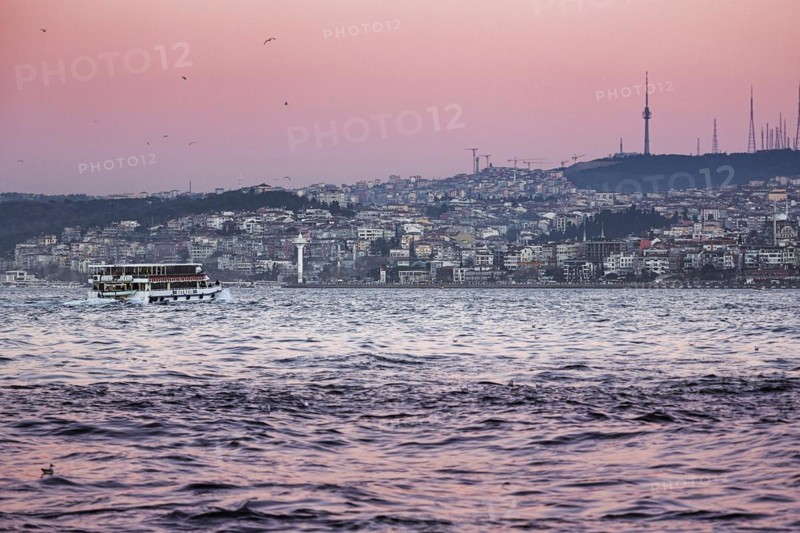 Ferry crossing the Bosphorus at dusk to Ueskuedar