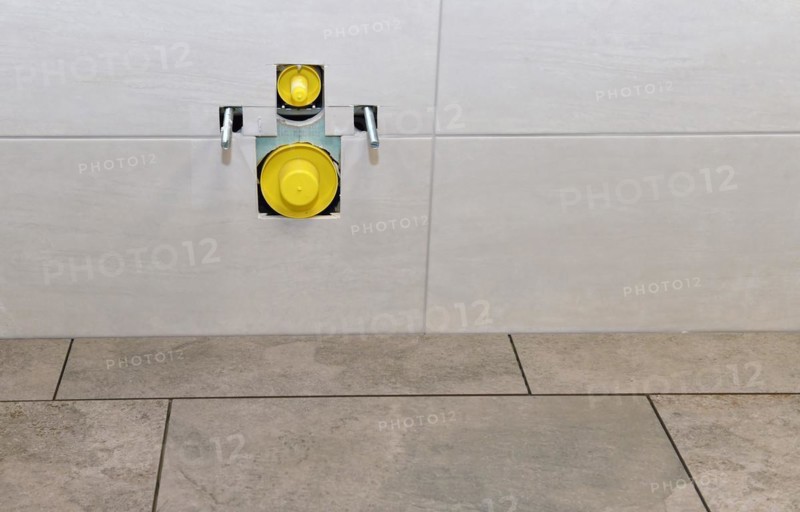 Tiler has installed tiles