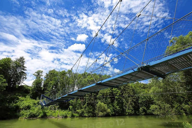 Steel suspension bridge over the Iller in fine weather