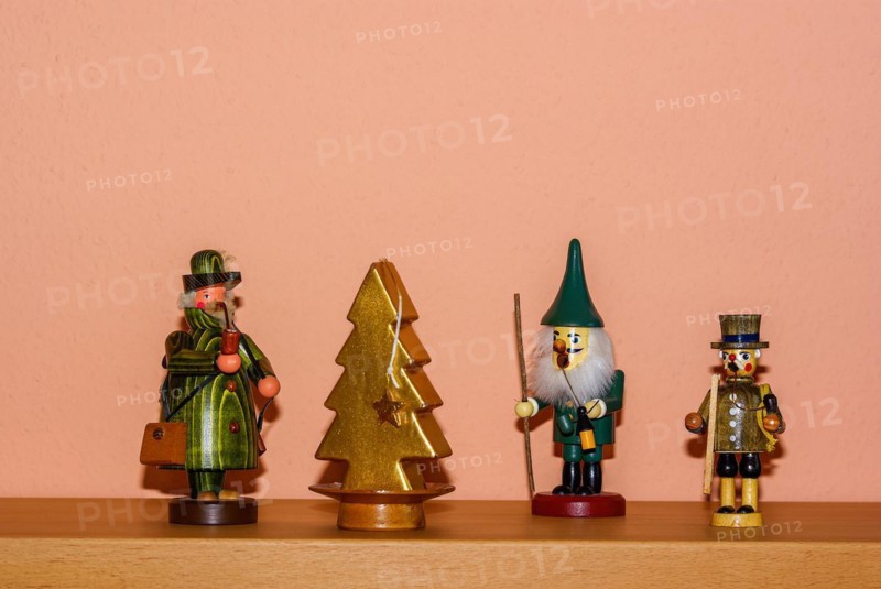 Christmas decoration consisting of three incense smokers and a candle in the shape of a fir tree