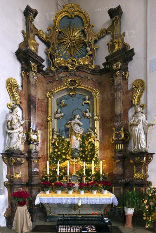 Altar of the Virgin Mary in the late Baroque St Bartholomews Church decorated for Christmas