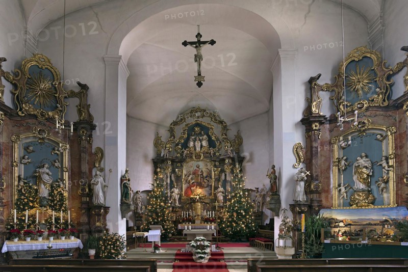 Altars of the late Baroque St Bartholomews Church decorated for Christmas