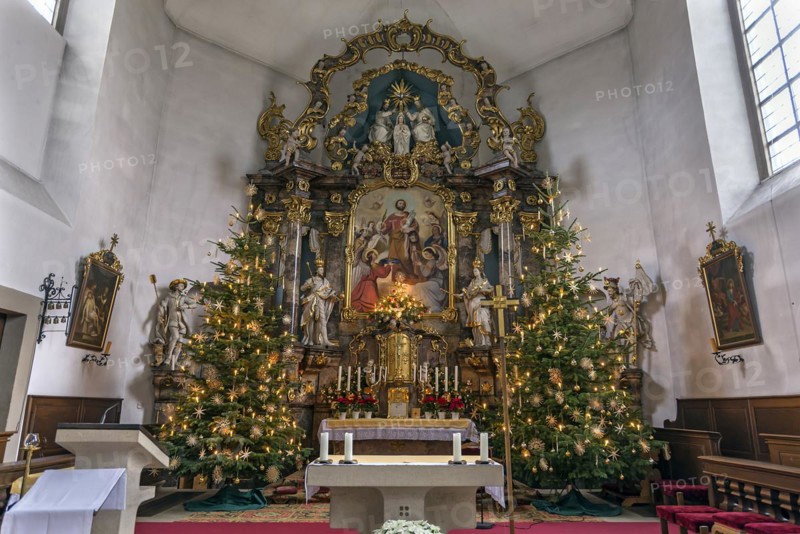 Altar of the late Baroque St Bartholomews Church decorated for Christmas