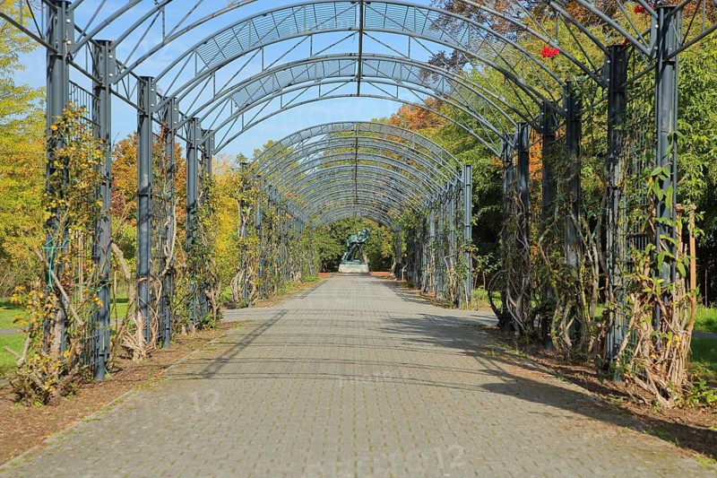 Arcade in Roseninsel with view of sculpture and monument