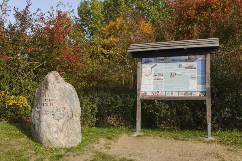 Information board and memorial stone at the former border to the GDR