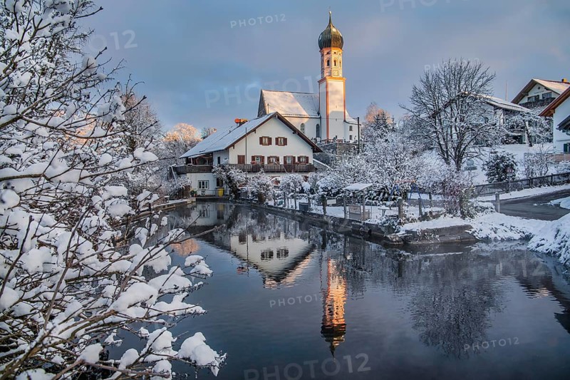 Uffinger Ach with parish church in winter