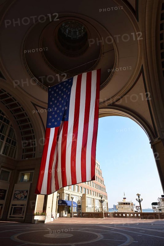 American flag in the arch of Rowes Wharf
