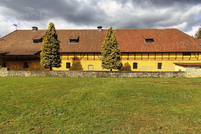 Yellow-painted farm building