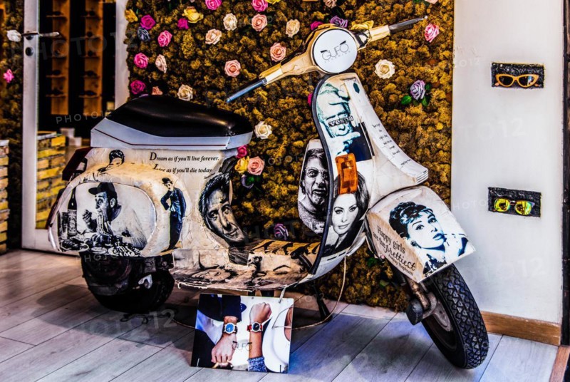 Artistic showcase with Vespa