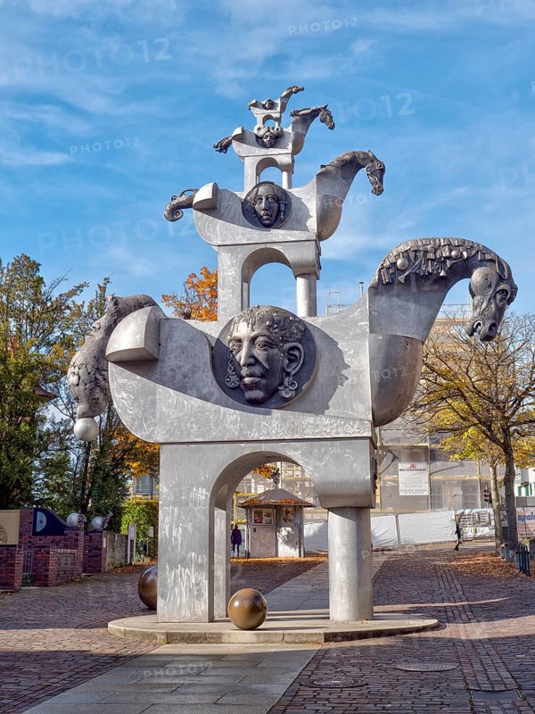 The large sculpture Tower of the Grey Horses on Hillerplatz