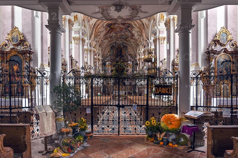 Harvest decoration in front of the baroque interior of the former monastery church of St. Margareta