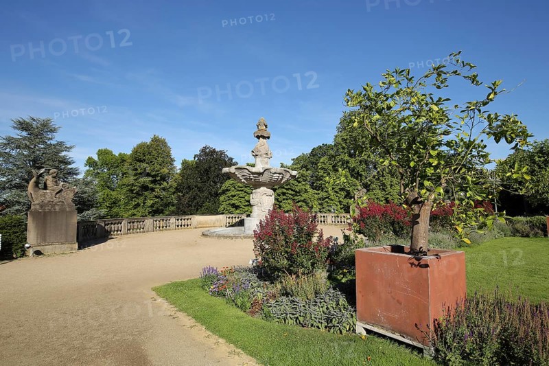 Spa park with ornamental fountain and sculpture in Bad Duerkheim