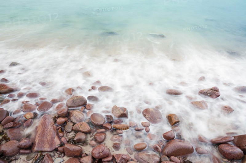 Detail of the swell on a sand and stone beach on the north-west coast of Scotland