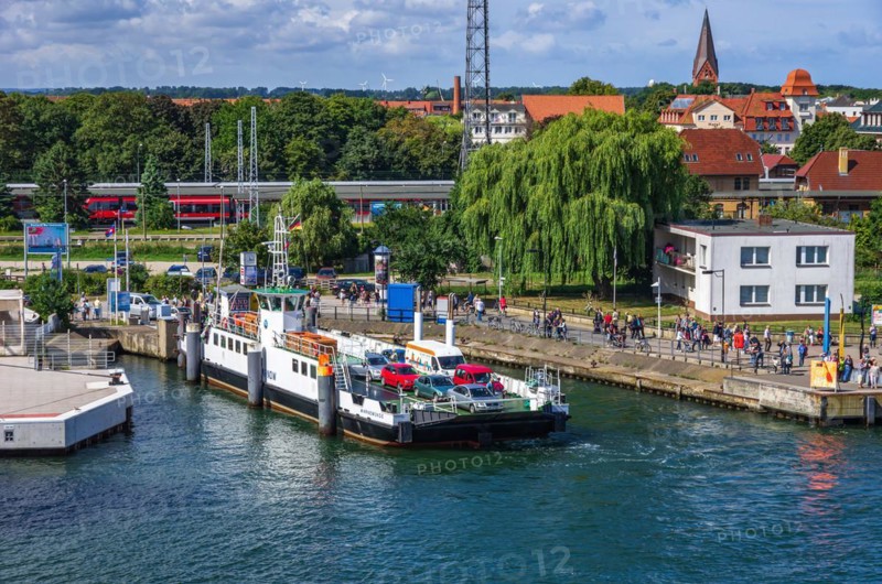 The Warnow car ferry fills up with vehicles and passengers on the left side of the Warnow river to cross it
