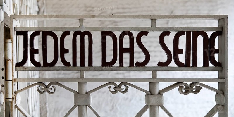Entrance gate to beech forest concentration camp with the saying Jedem das Seine