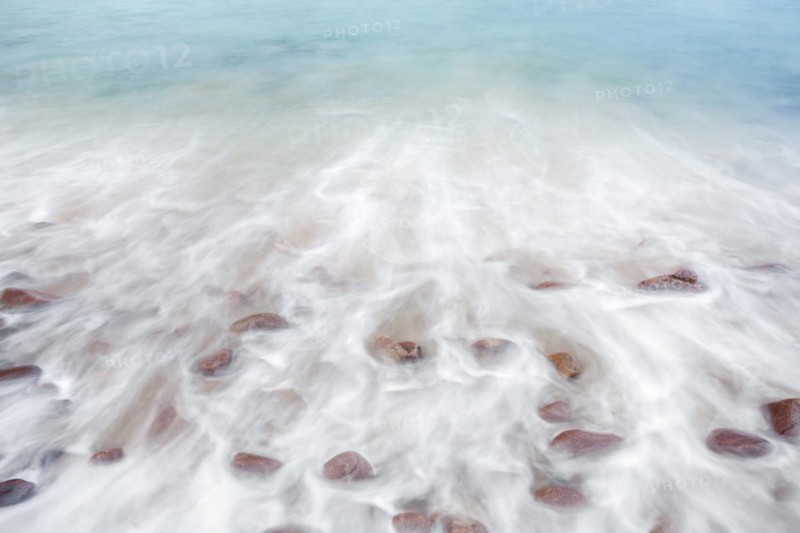 Detail of the swell on a sand and stone beach on the north-west coast of Scotland