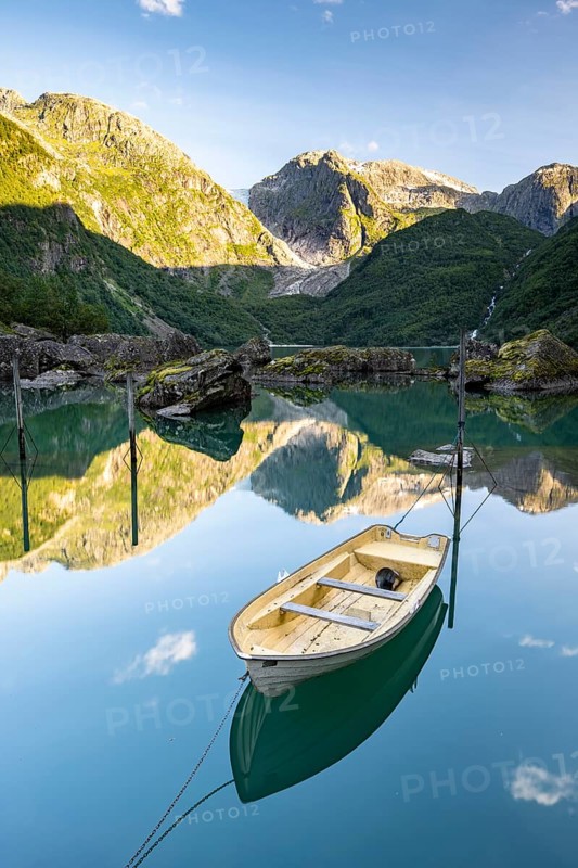 Glacial lake Bondhusvatnet with rowing boat