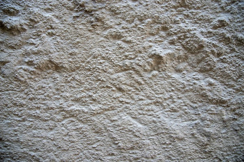 Rough plaster facade as texture or background