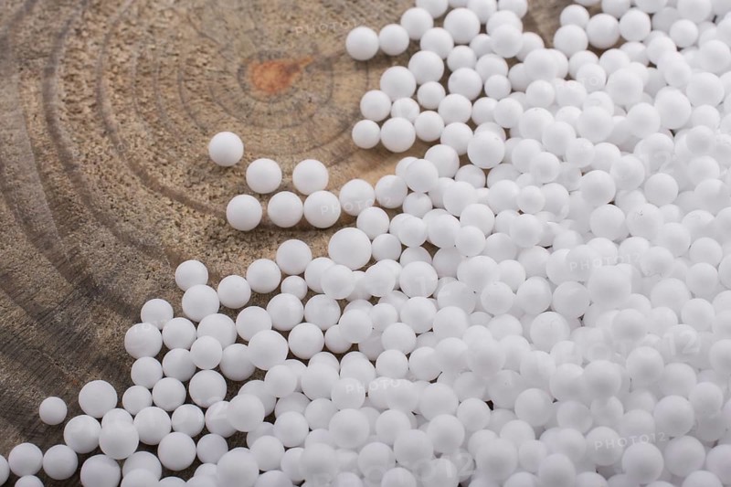White little polystyrene foam balls as background