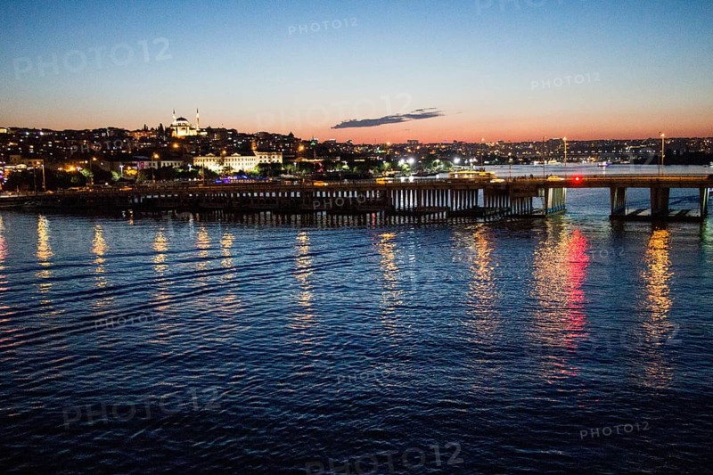 Ataturk bridge on Golden Horn at night on display