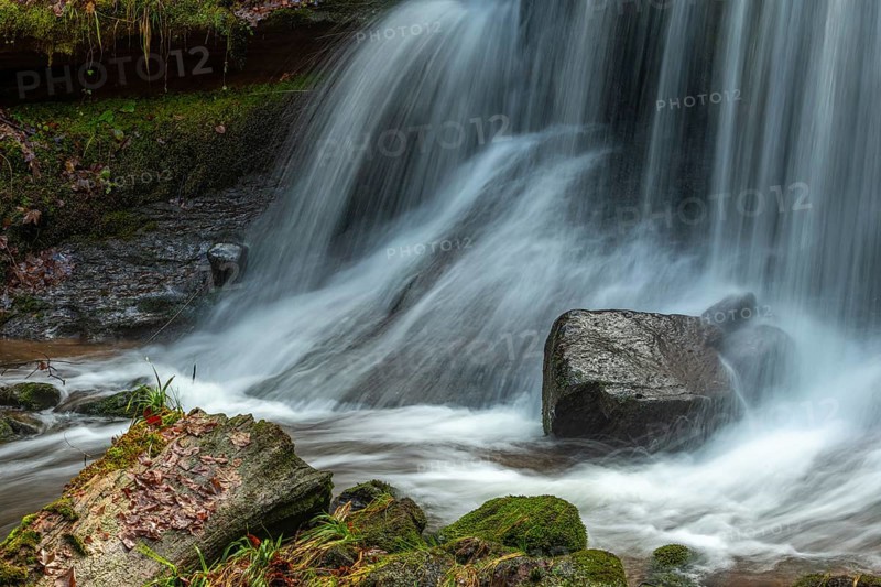 Fresh water waterfall on rocks moss cover in mountain. Fresh water waterfall on rocks moss cover in mountain.osges Alsace