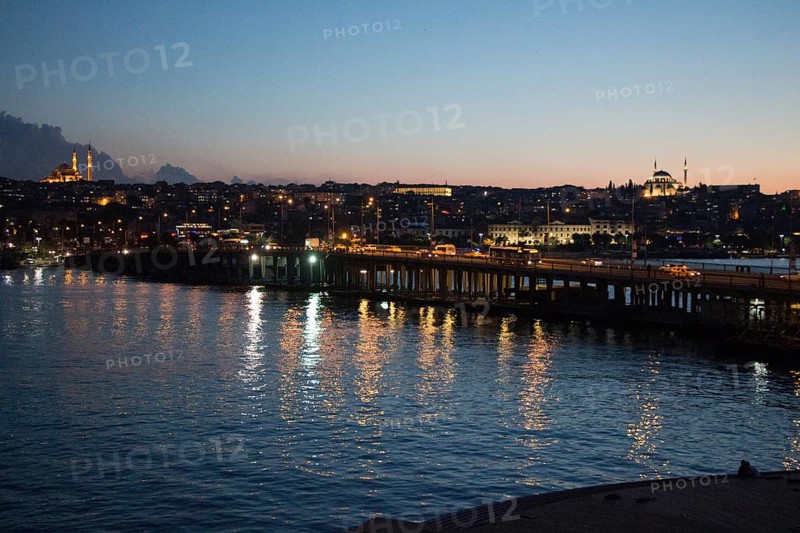 Ataturk bridge on Golden Horn at night on display
