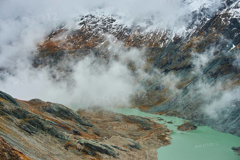 Clouds lying in the valley at Pasterze Hochalpengletscher