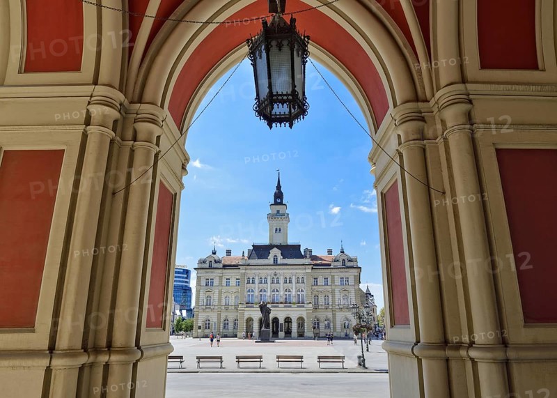 City Hall viewed from below the arches of the Name of Mary Church