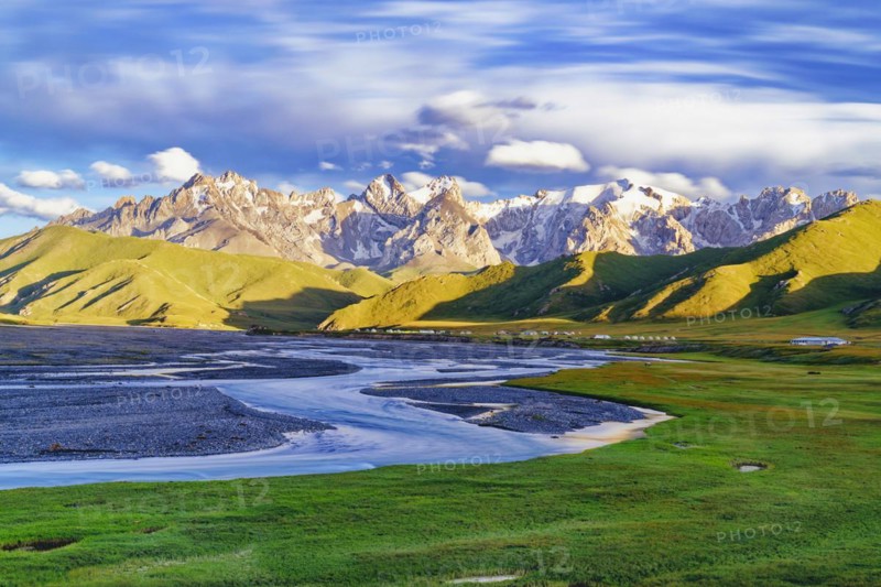 Sunset over the Central Tien Shan Mountains and glacier river