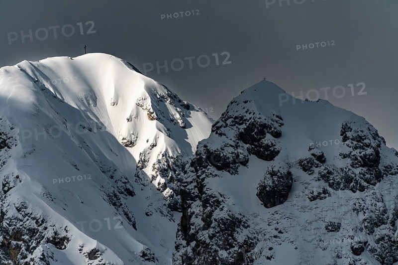 Peak of the Koellenspitze in snowy mountain landscape