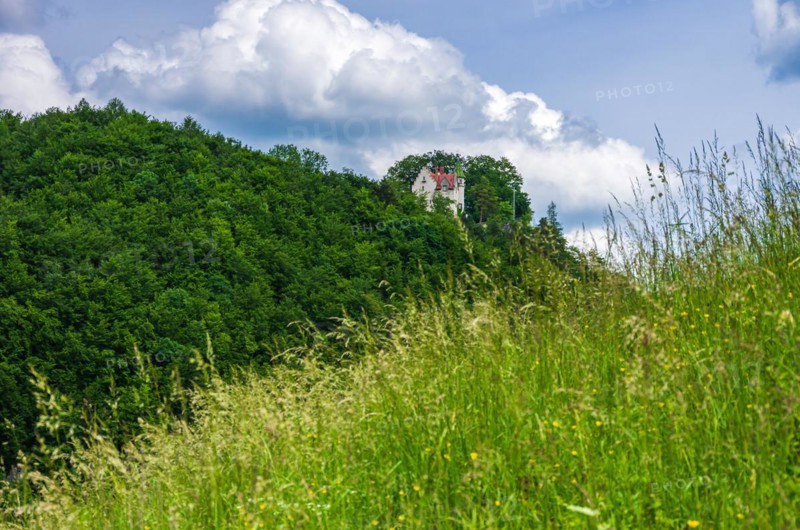 Landscape of the Swabian Alb with a view of Uhenfels Castle near Seeburg between Bad Urach and Muensingen