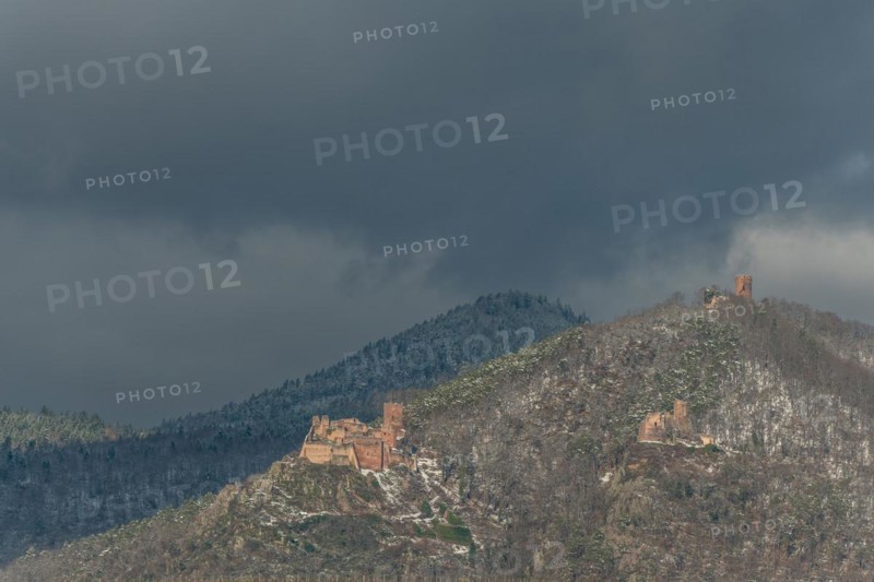 The three castles under the snow near the wine route in winter. Ribeauville