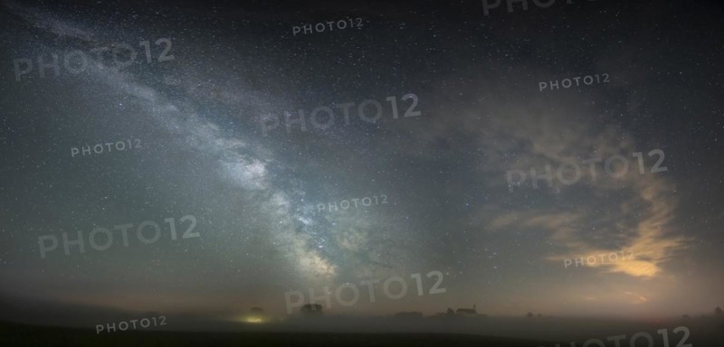 Church of St. Alban with village of Goerwangs and Milky Way with starry sky
