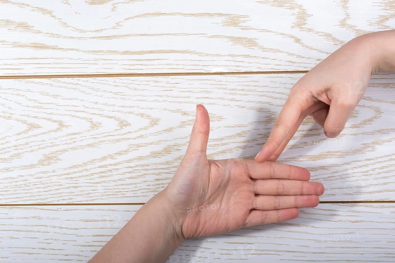 Hands making rock
