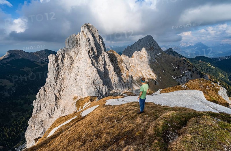 Hiker at the summit of Rote Flueh