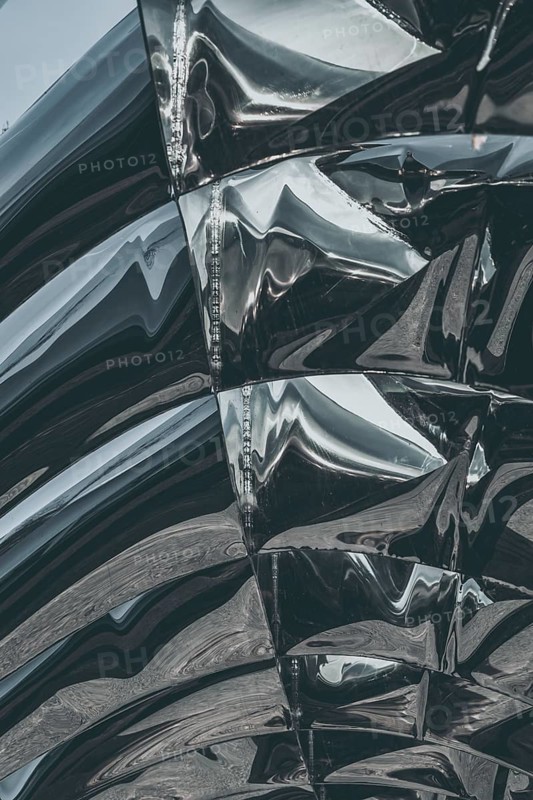 Shiny metal part of the sculpture