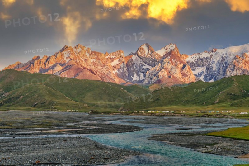 Sunset over the Central Tien Shan Mountains and glacier river