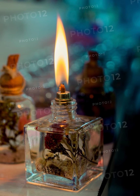 Burning candle making light in view