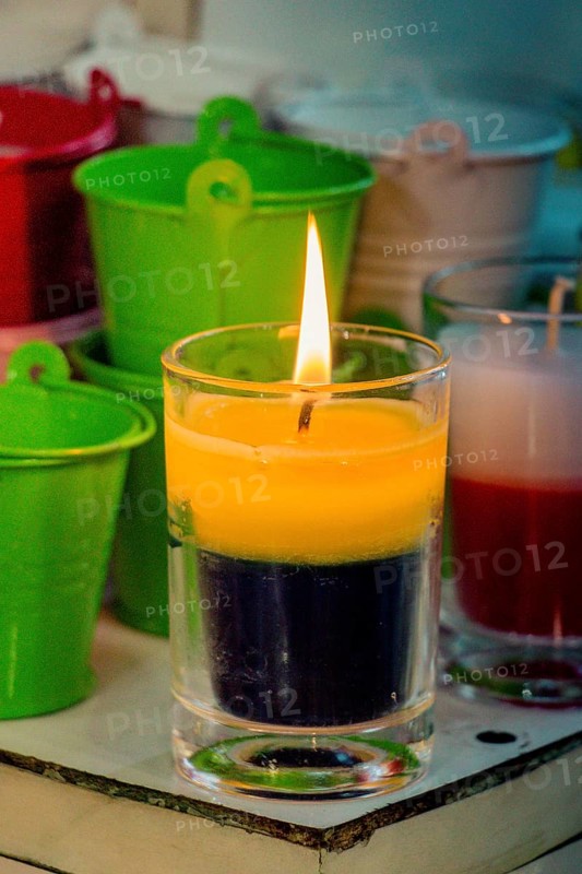Burning candle making light in view
