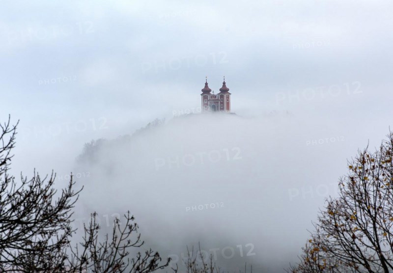 Calvary over clouds of fog
