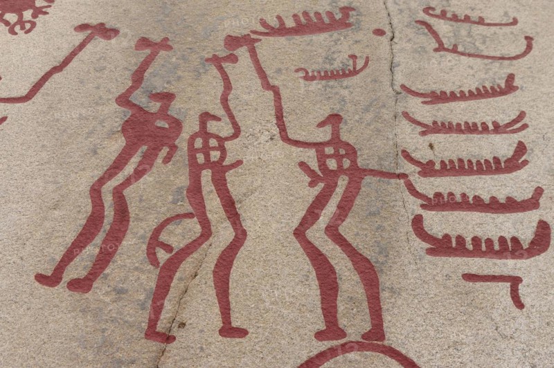 Rock carvings with figures
