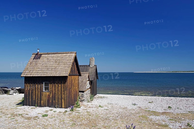 Old fisherman's house on a barren beach