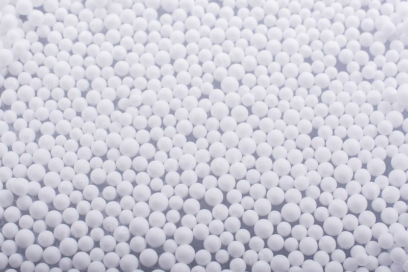 White little polystyrene foam balls as background