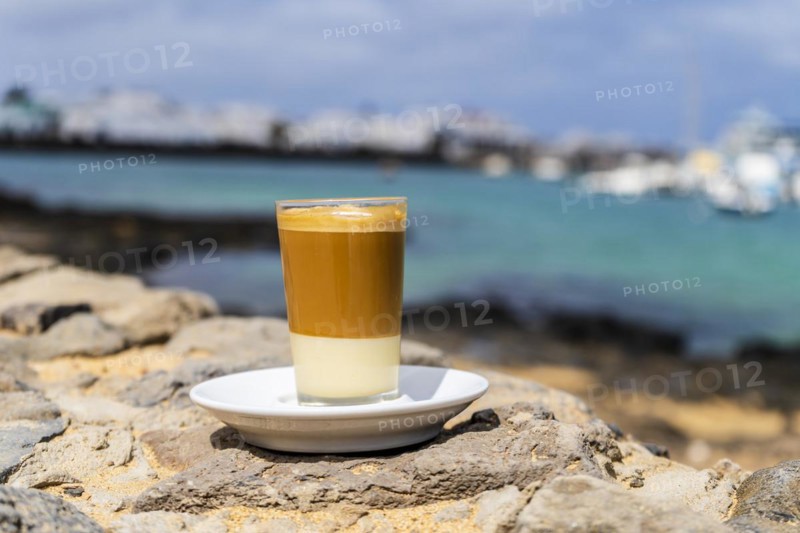 Delicious barraquito coffee with liquor and condensed milk